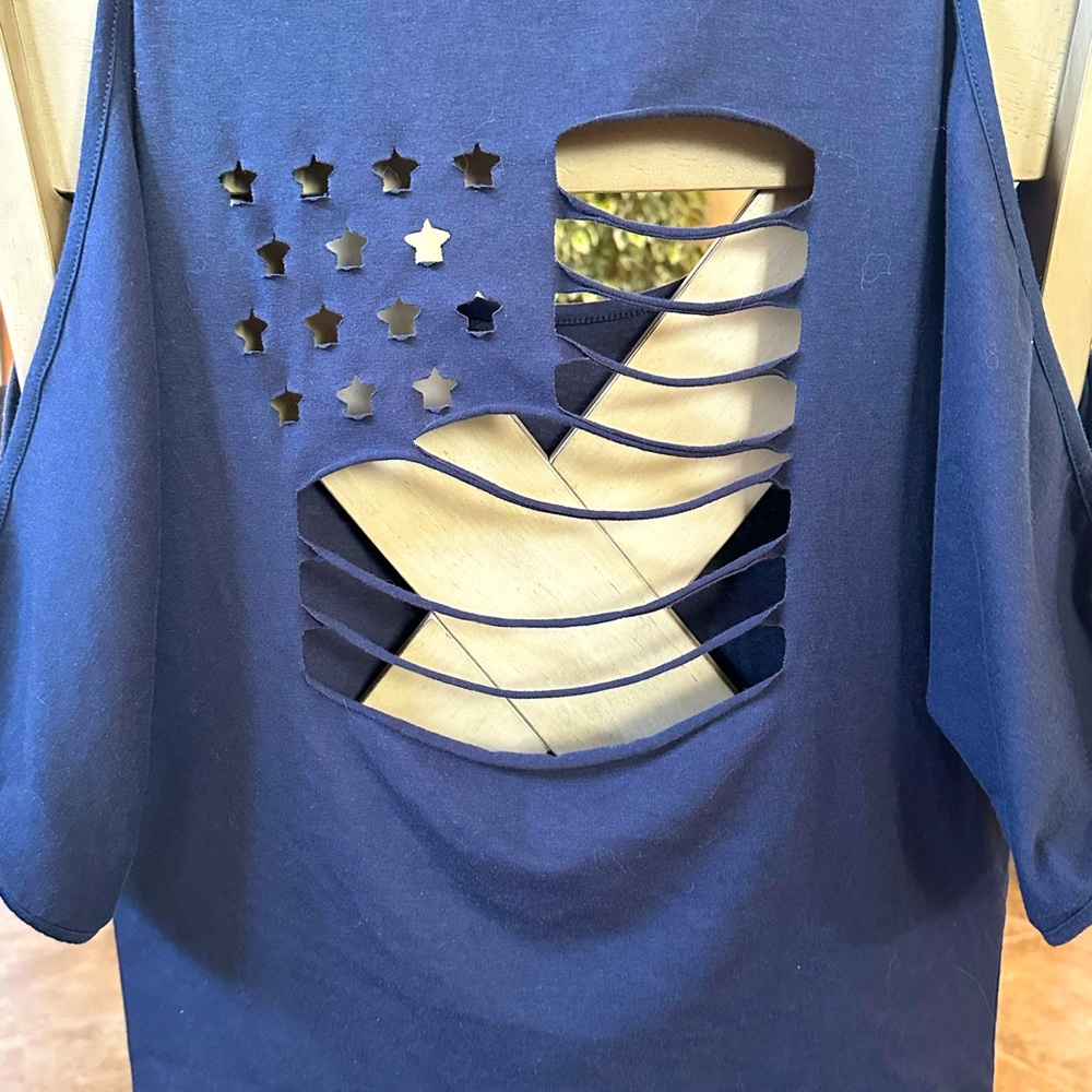 Navy blue cut out shirt.